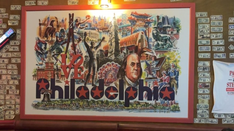 Philadelphia poster surrounded by bills in Passyunk Avenue in London