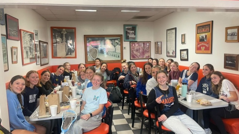 A lacrosse team enjoying Doumar's Barbecue