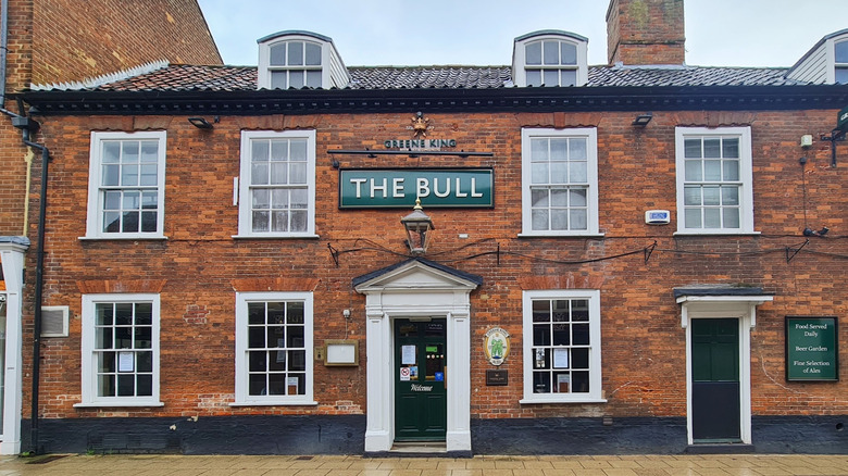 The brick facade of The Bull pub in Dereham, England