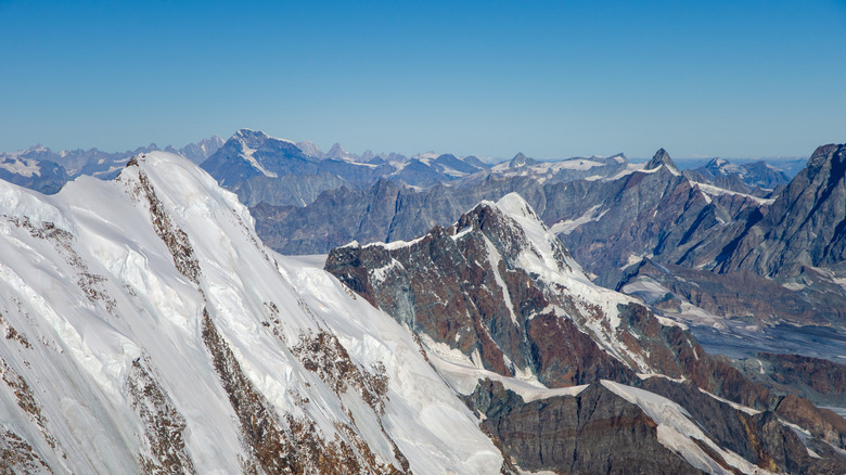 Snow-covered mountain peaks seen from the Regina Margherita hut