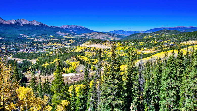 The town of Breckenridge is sprawled across a valley on a bright shoulder-season day in Colorado