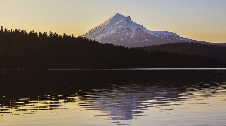 Calm water and mountain at sunset in Lake of the Woods, Oregon