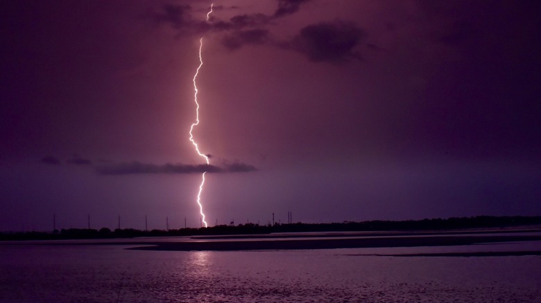 A lightning strike viewed from the beach