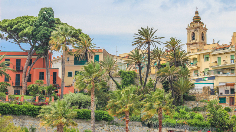 Palm trees surrounding the watchtower in Bordighera, Italy, a symbol of the town that has appeared in Claude Monet's paintings.