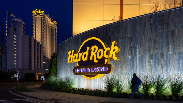Atlantic City's The Hard Rock Hotel and Casino's entrance glowing at night