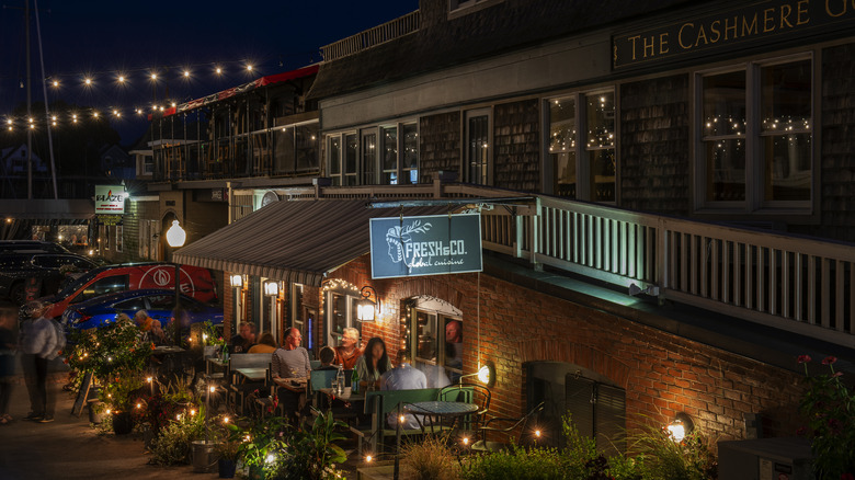 Outdoor dining by harbor in Camden