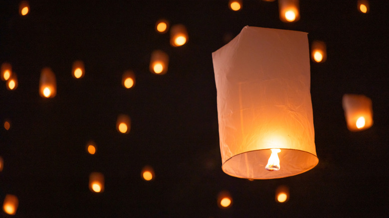 Lantern floating into sky during Yi Peng Lantern Festival