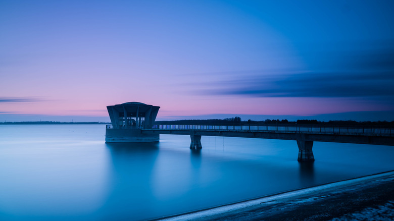 The aeration tower situated over Grafham Water at twilight