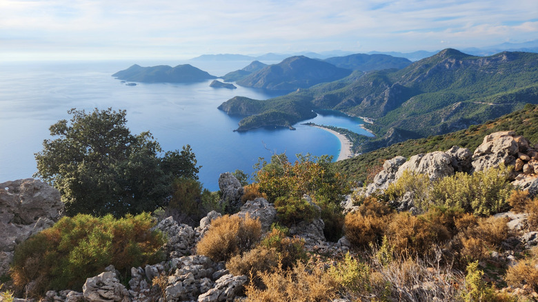 Rocky slope overlooking a bay along the Lycian Way in Turkey