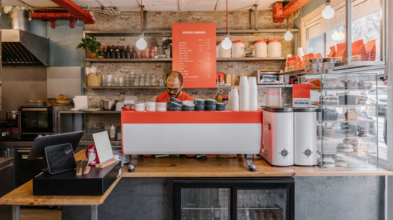 A man working in a coffee shop