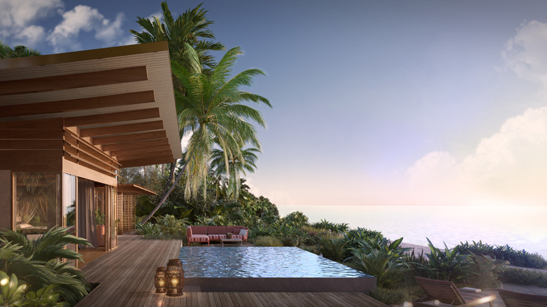 Architectural rendering of Bvlgari Hotel, with open doors, deck, and infinity pool on the ocean
