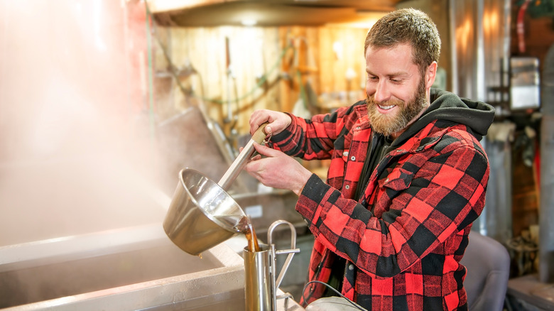 A sugar shack farmer wearing a classic plaid shirt