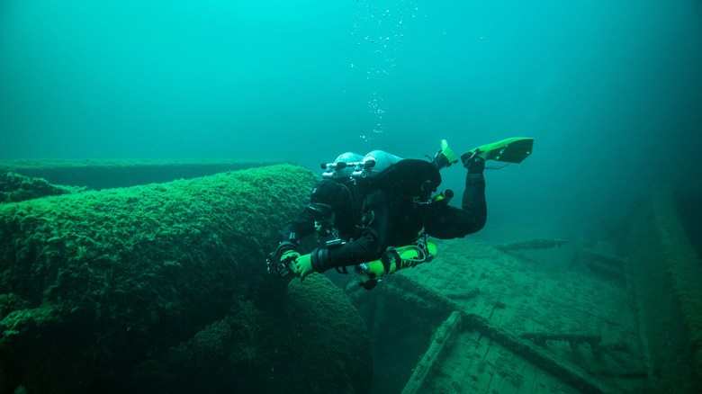Diver exploring a shipwreck in Michigan