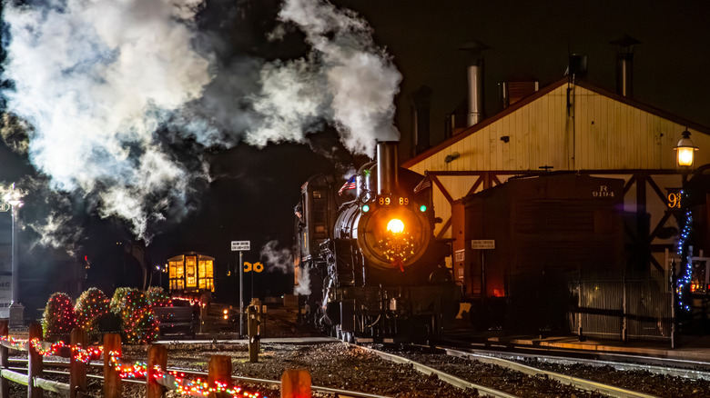 A train at night with holiday lights in Pennsylvania