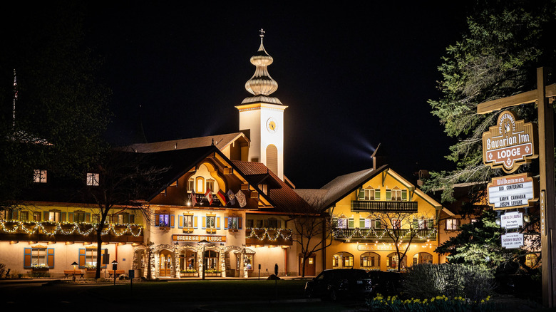 The Bavarian-style architecture of the Bavarian Inn Lodge, illuminated at night