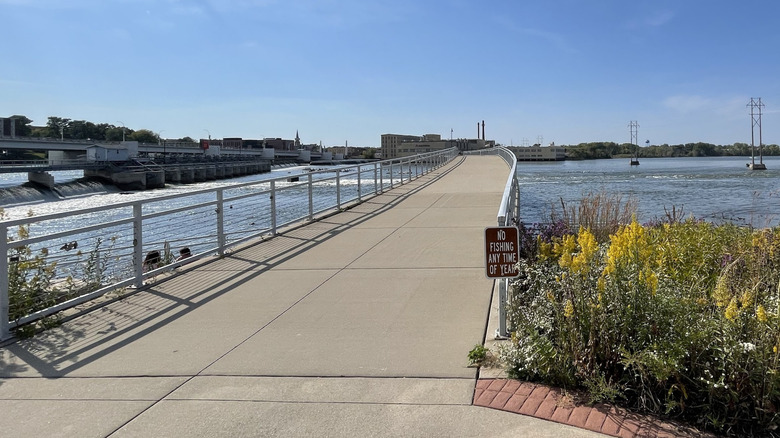 Wide view of the De Pere Wildlife Viewing Pier along the Fox River in De Pere, Wisconsin