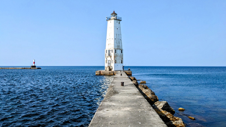 View across the length of the Frankfort North Pier Breakwater and lighthouse in Michigan