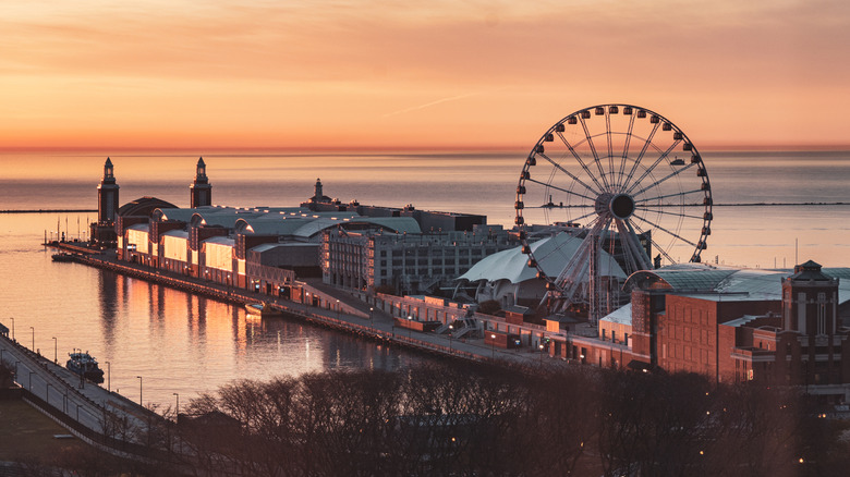 Navy Pier in Chicago seen during sunrise with a view of the Ferris wheel and headhouse