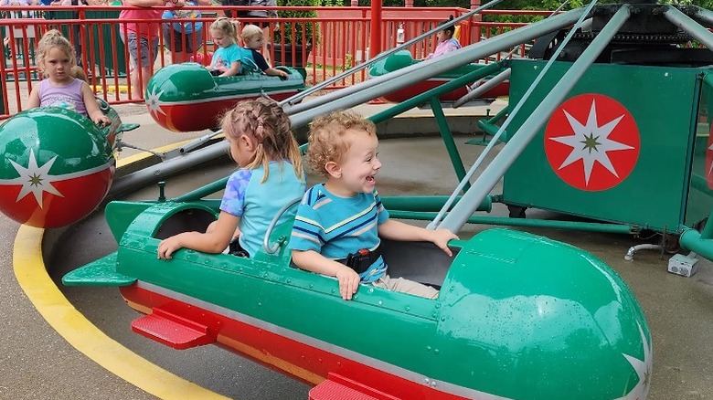 Children having fun on a small rocket ride at Holiday World & Splashin' Safari