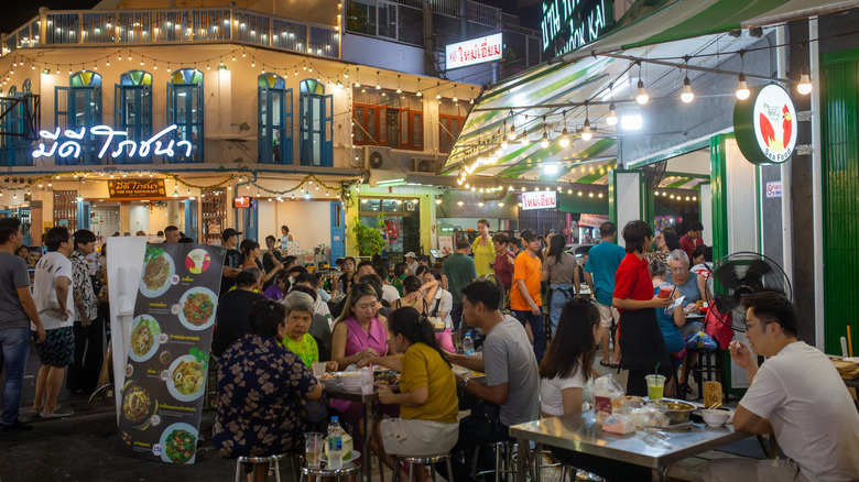 people eating at Banthat Thong Road in Bangkok