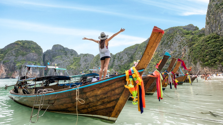 Woman on boat in Thailand