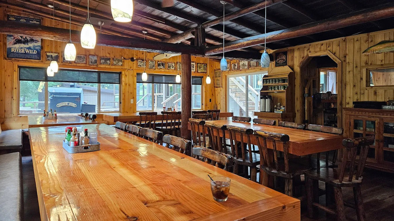 The rustic communal dining room at Paradise Lodge in Oregon