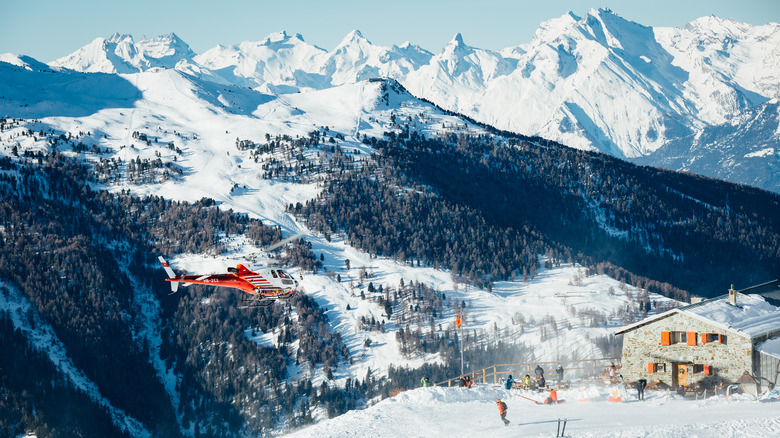 Ski range on a steep snow clad slope
