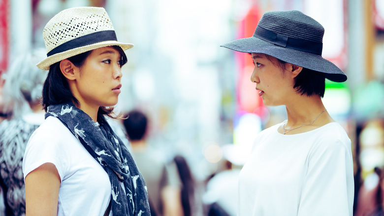 Two women staring