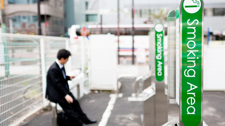 Man in smoking area