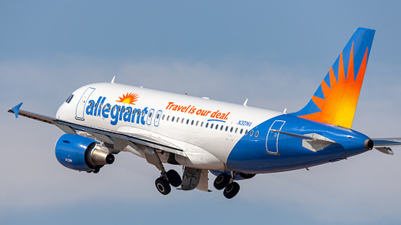 Allegiant Air Airbus A319-112 airliner aircraft N301NV taking off from Phoenix-Mesa Gateway airport in Arizona.