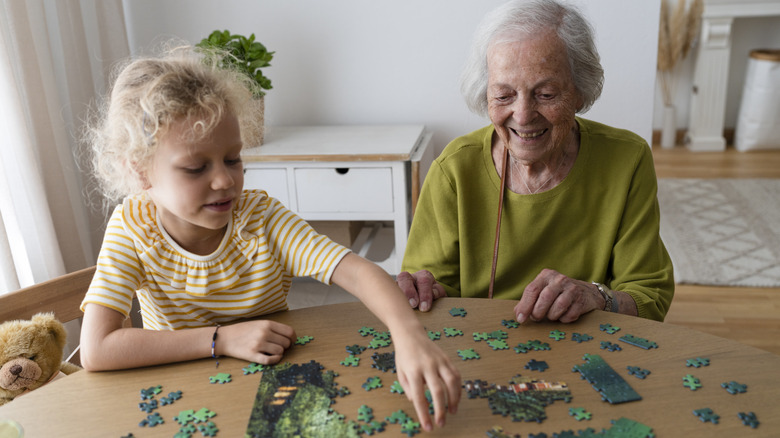Woman and child puzzling