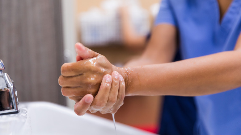 Person washing hands