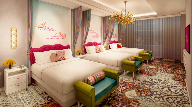 A suite in SongTeller Hotel with song lyrics on the wall above the beds