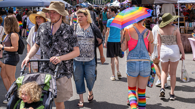Festivalgoers walk through the streets at Out! Raleigh Pride