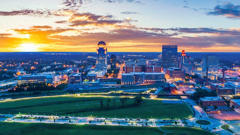 Colorful aerial of the Winston-Salem skyline at dusk