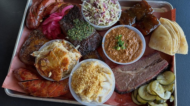 Plate filled with meat and sides at InterStellar BBQ in Austin, Texas