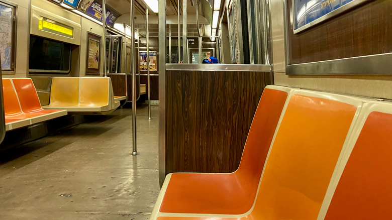 The interior of an R subway train in New York City