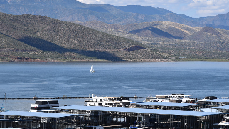 Sailboat on water at Roosevelt Lake near marina