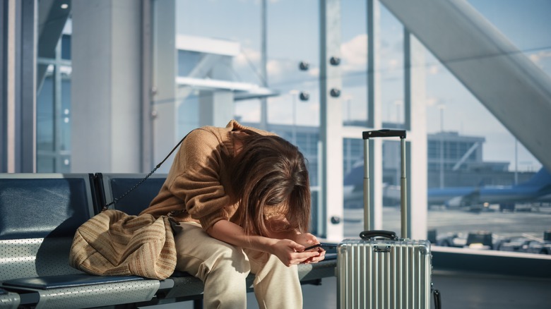 Stressed out traveler in airport