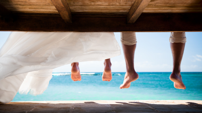 Bride and groom at beach