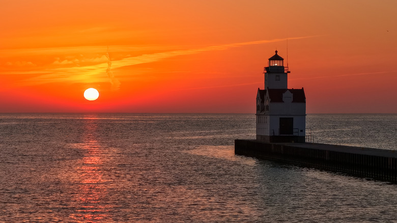 Sunrise over the Kewaunee lighthouse in Kewaunee, Wisconsin, on Lake Michigan