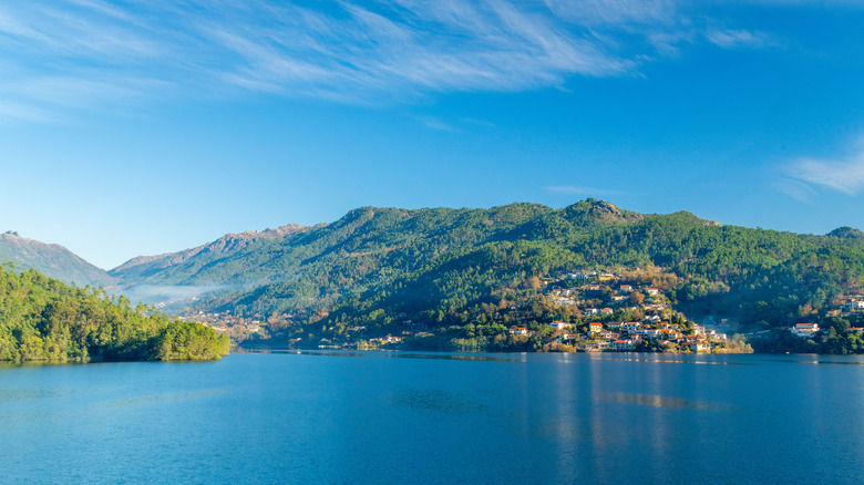 The Cavado River and a small, hillside village in Peneda-Geres National Park, Portugal