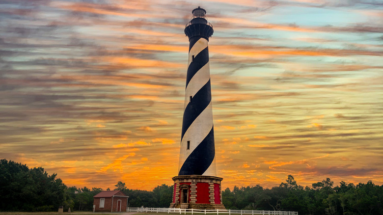 North Carolina's Cape Hatteras Lighthouse at sunset.