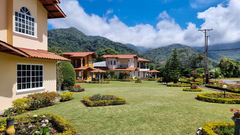 Houses with manicured lawns in the volcanic hills of Boquete, Panama