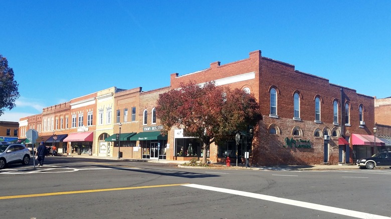 Colorful brick building facades with shop awnings in downtown McCormick, South Carolina