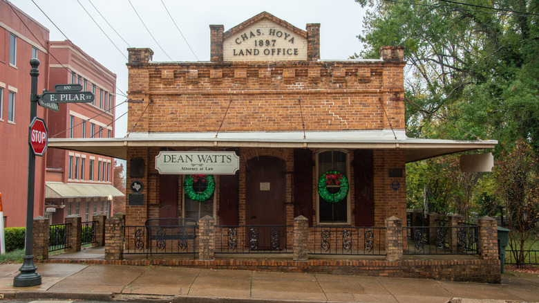 A historic brick building in downtown Nacogdoches, Texas