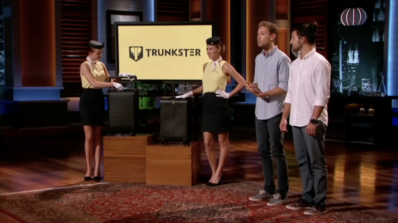 Trunkster founders displaying their suitcases with two assistants on Shark Tank in 2015