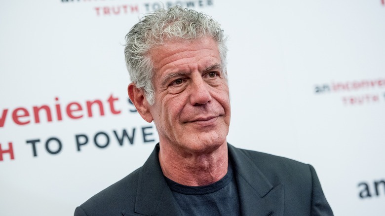 Anthony Bourdain posing at an event