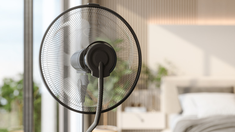 A fan in a hotel room