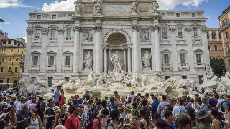 People at the Trevi Fountain in Rome, Italy